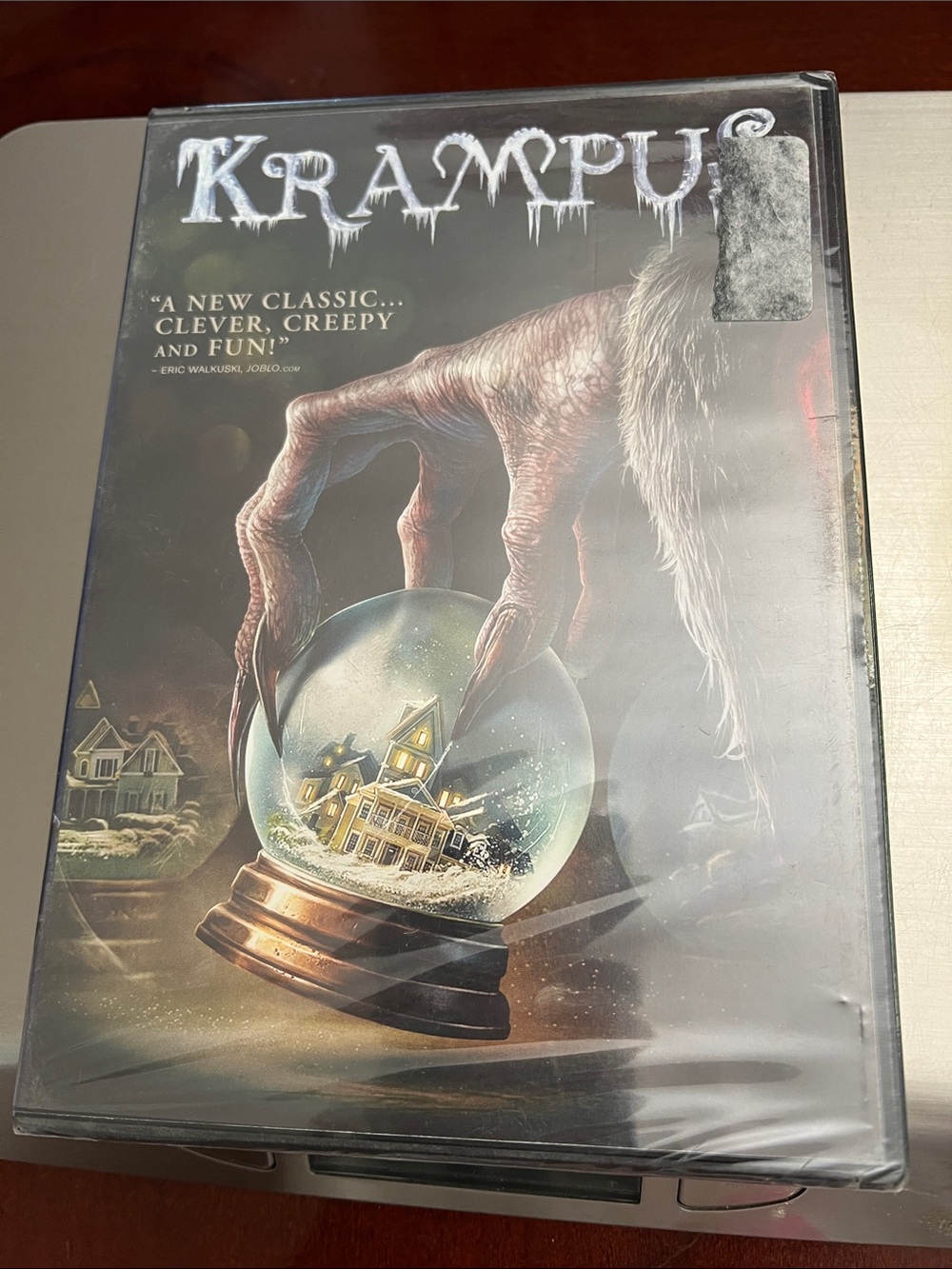 Universal Krampus DVD Cover Art in Black, White, Brown